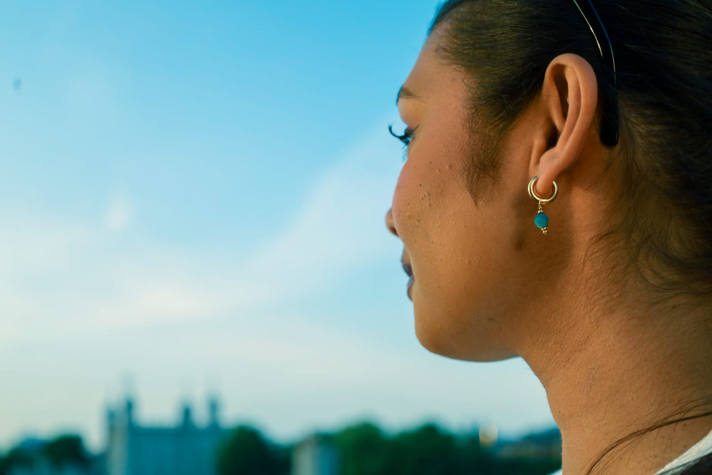 BLUE STONE HUGGIES - GOLD PLATED WITH REMOVABLE CHARM